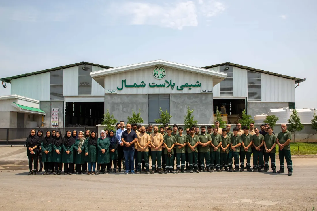 The Shimi Plast Shomal team outside the factory